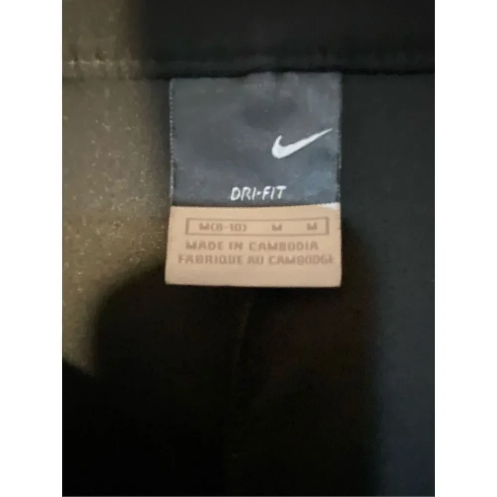 Nike woman’s Black dry, fit training, pants, golf double snap closure size mediu